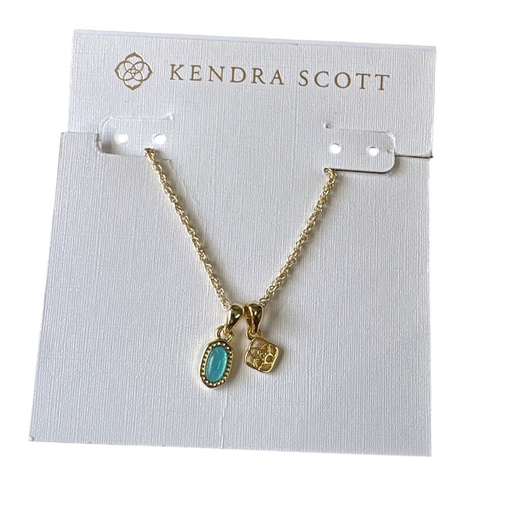 Kendra Scott Gold Tone Turquoise Oval Pendant Filigree Logo Adjustable Necklace